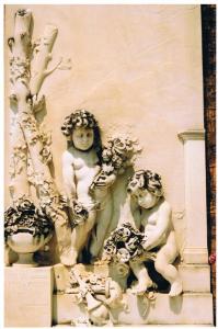 Putti or small cherubs on a large wall monument. copyright Carole Tyrrell