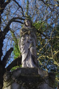 A classical Roman mourning figure swathed in robes on top of Daniel vault.. copyright Carole Tyrrell 