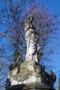 Another view of the mourning woman, cherubs and garland. copyright Carole Tyrrell