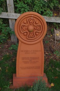 A modern terracotta memorial in Compton churchyard copyright Carole Tyrrell
